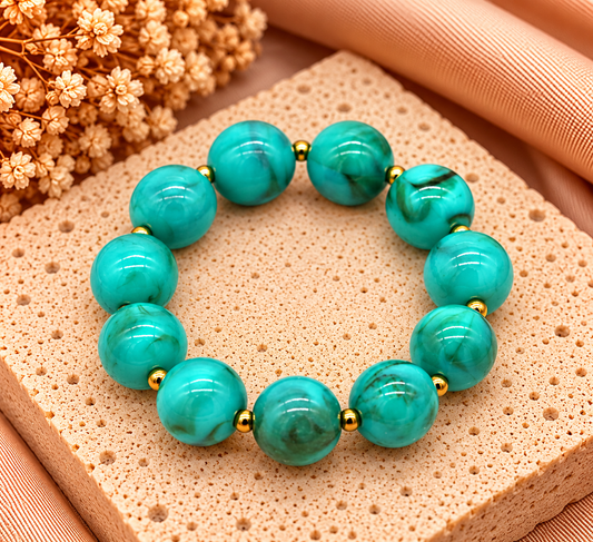 Elastische Armband Turquoise Blauw – Acryl Kralen en RVS