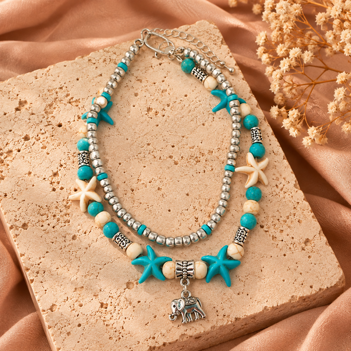 Enkelband met zeesterren en olifant | Turquoise & zilverkleurig